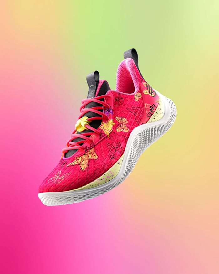 View of Stephen Curry's pink and yellow shoe.